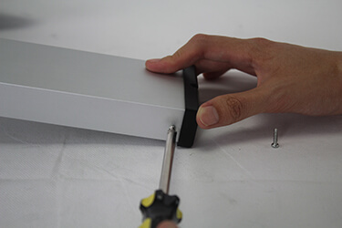 Unscrewing Black Cap from Pillar